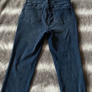 NYDJ dark wash straight jeans.